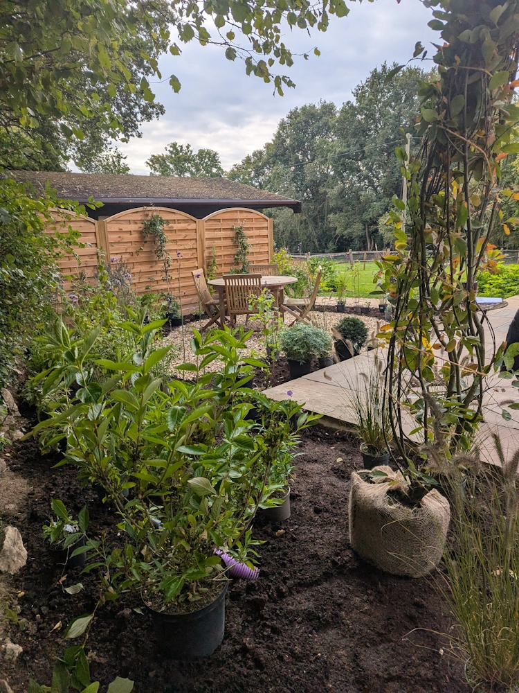 Scented planting varieties around the snug seating area with personal meaning