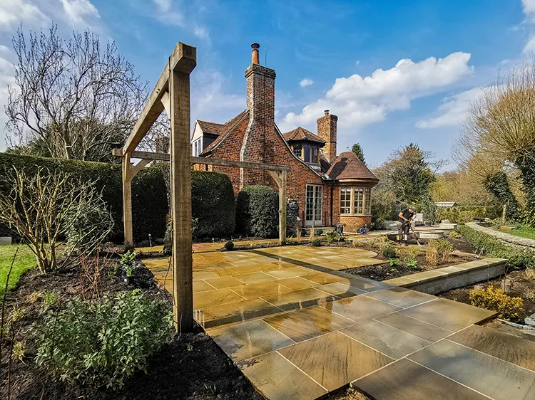 New landscaping with pergola and york stone paving