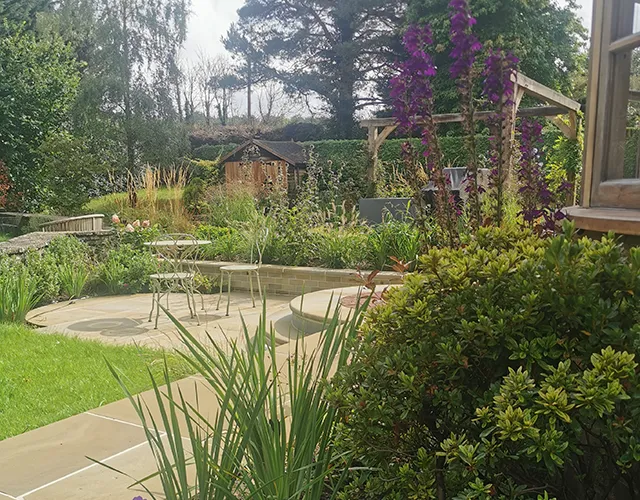 Garden with planting by a river